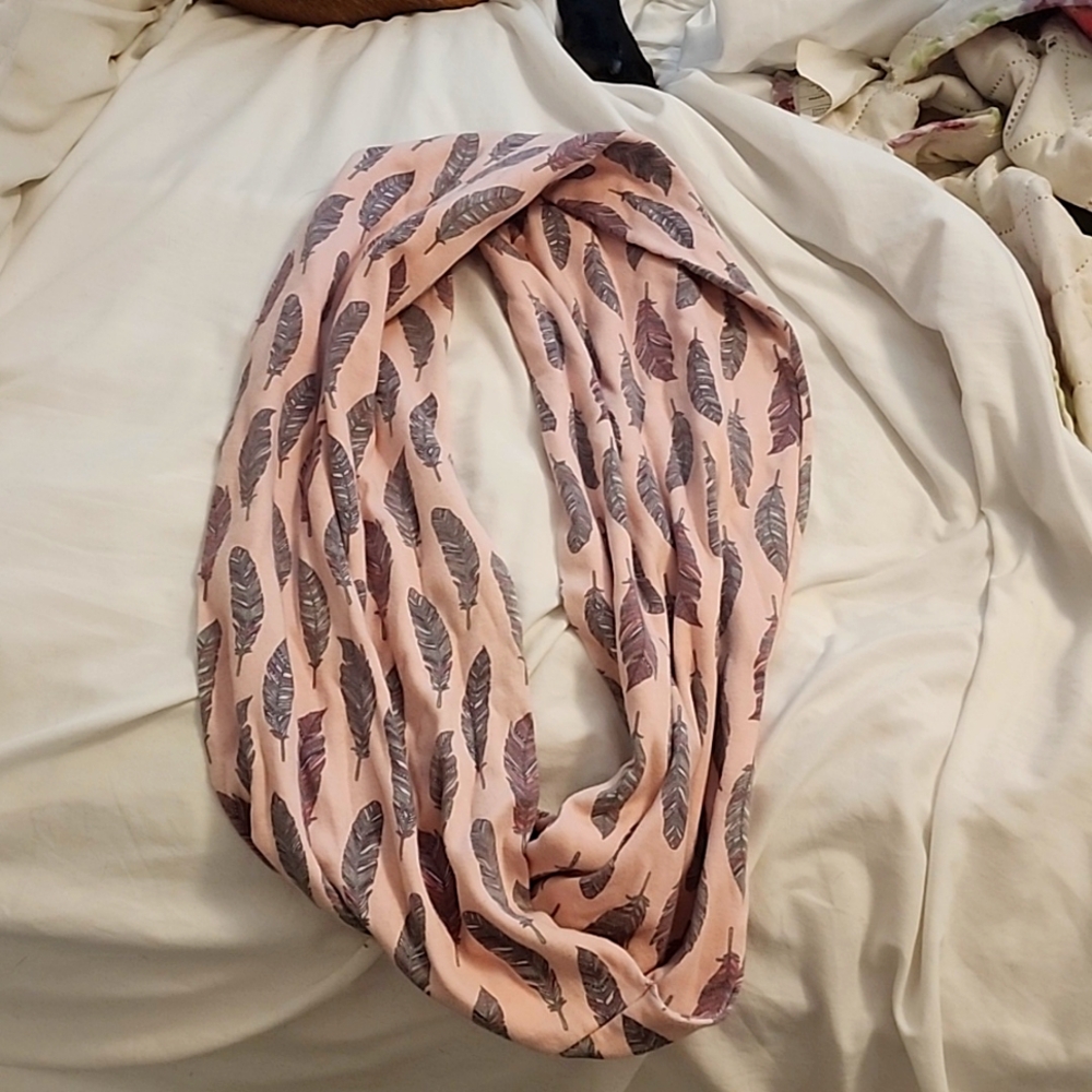 Infinity scarf. Handmade by yours truly. Light pink with colorful feathers.
